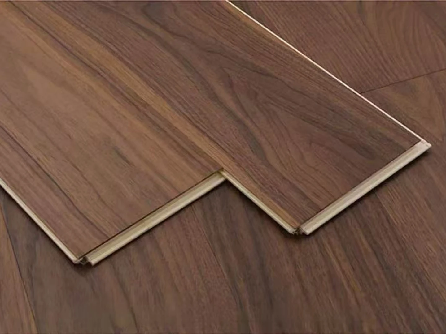 Black walnut wood flooring boards with tongue-and-groove joints